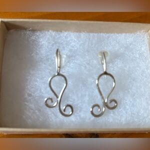 Original design silver earrings.